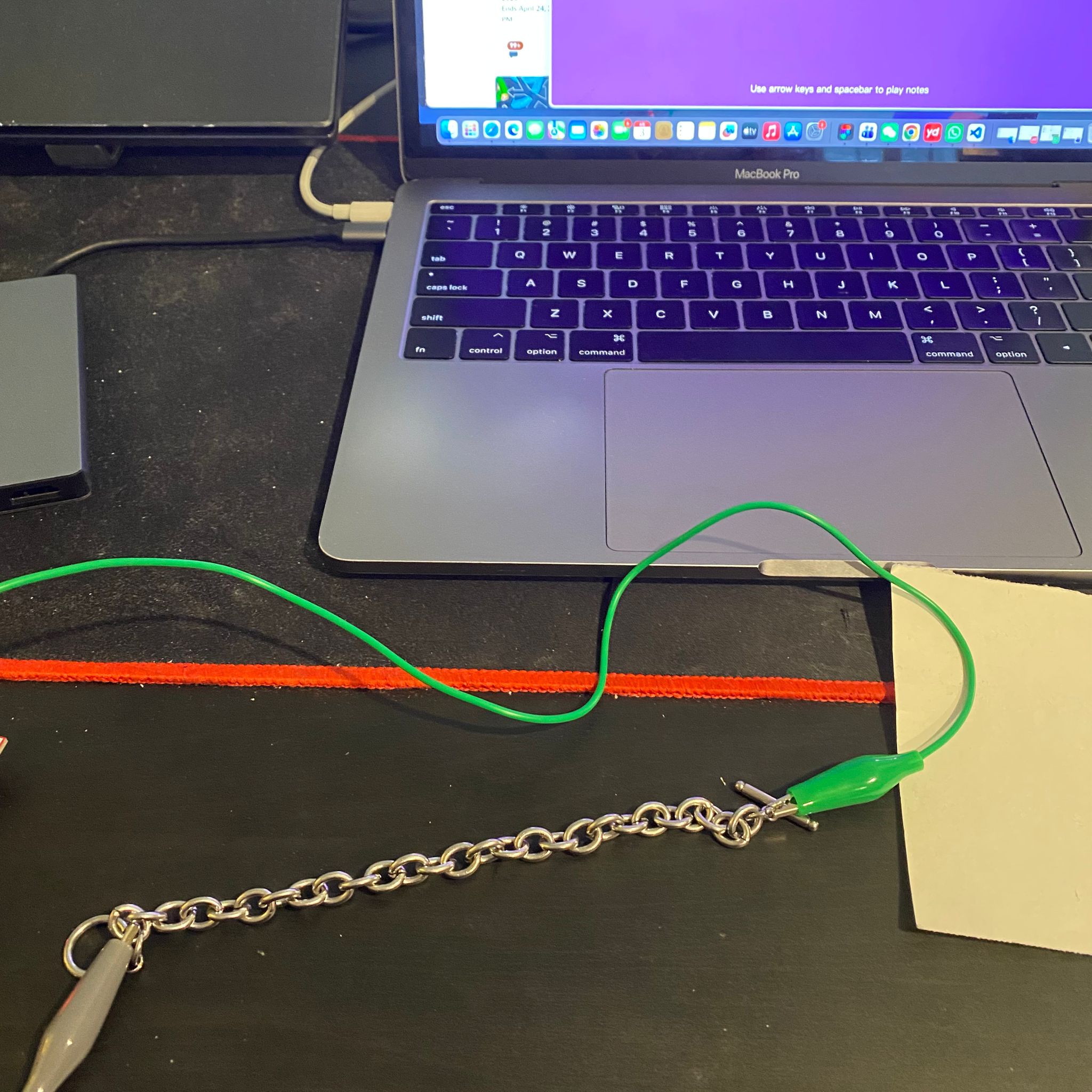 I attempted to connect the Makey Makey using a bracelet to observe the reaction.