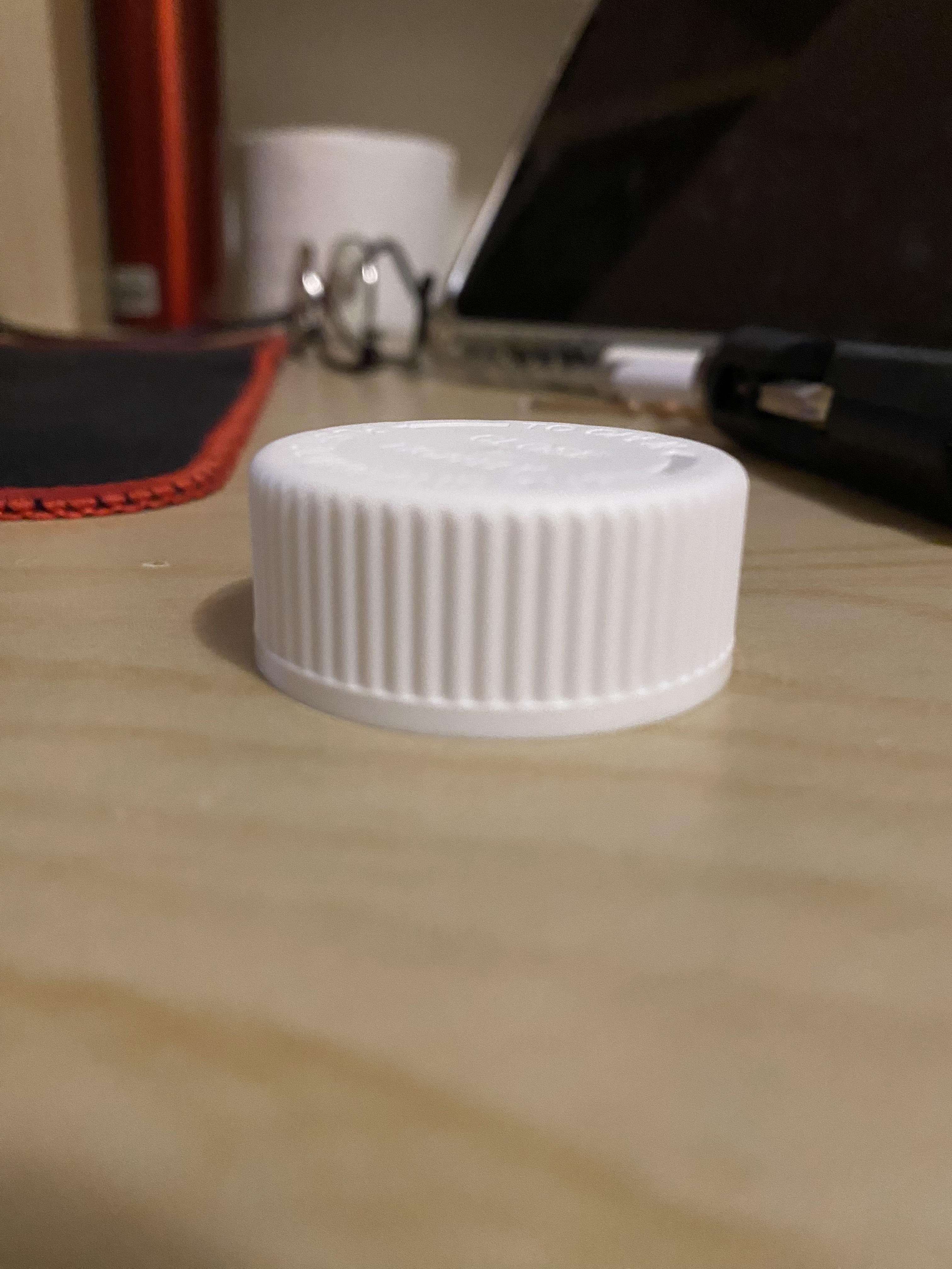 A close-up picture of the lid of the medicien bottle