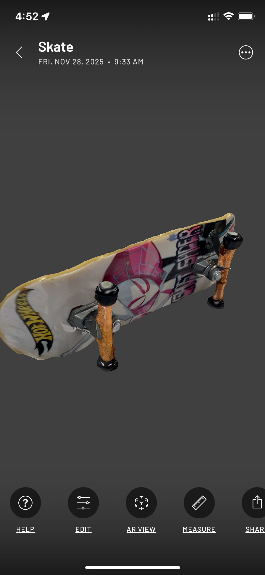Scanned toy skateboard front view