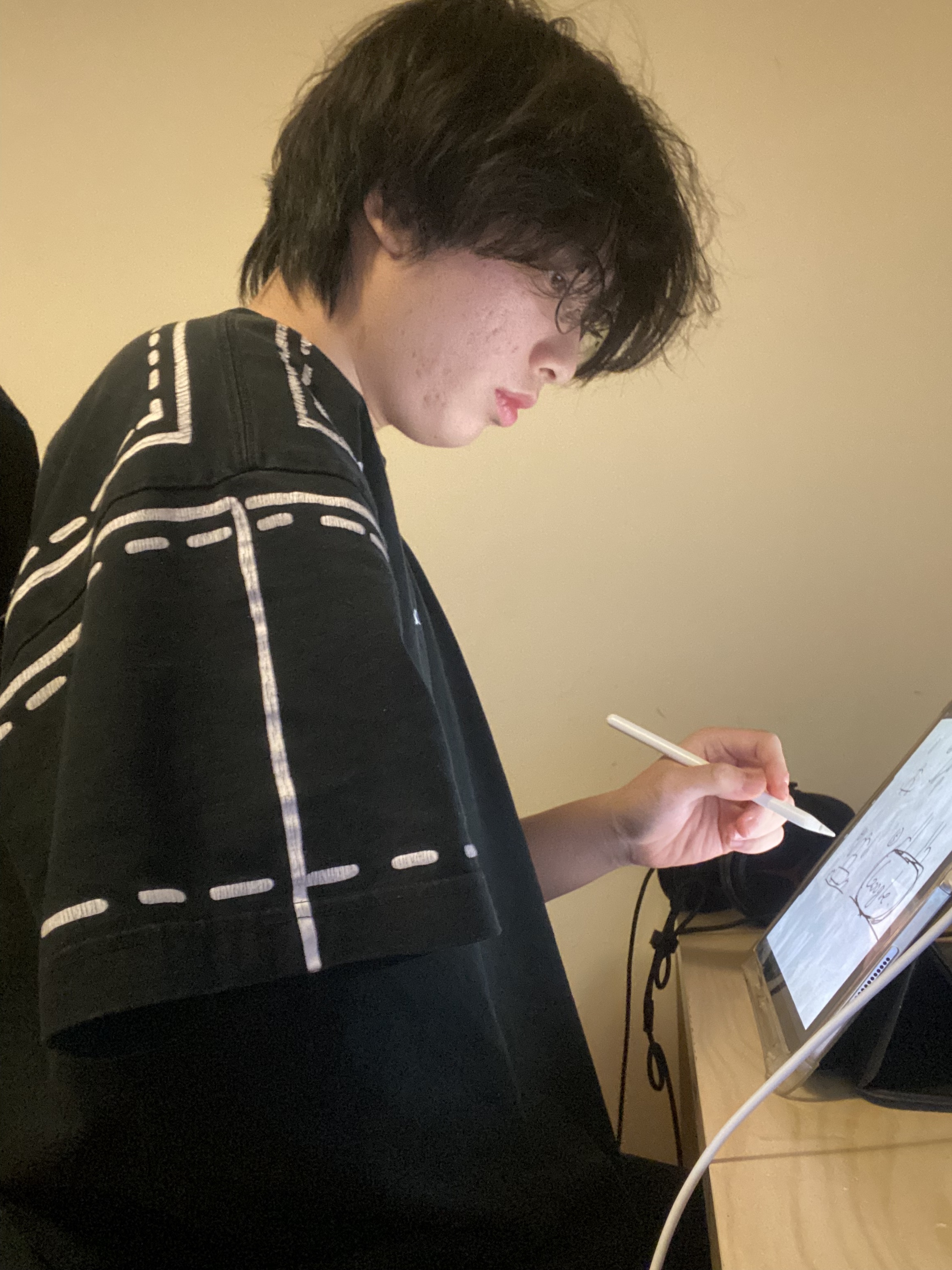 A photo depicting a person with a disability engaging in self-learning